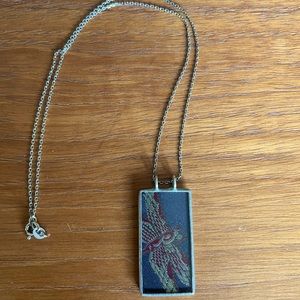 Necklace with silk pendant